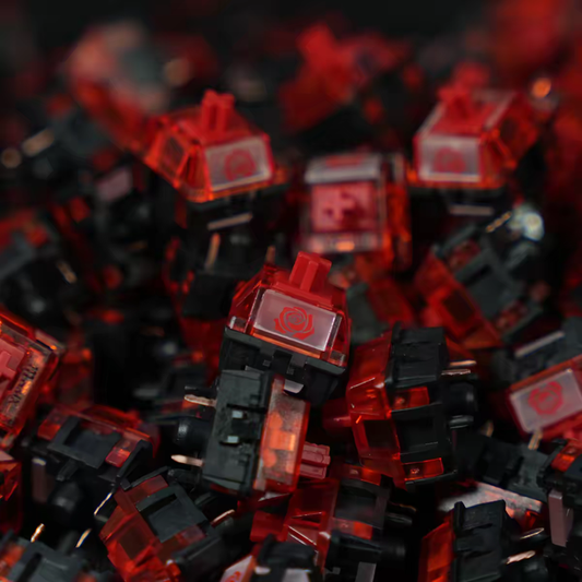 TypeHero HMX Rosa Centifolia linear mechanical keyboard switches with red translucent tops and black housings.